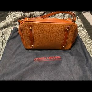Dooney and Burke shoulder bag.  Durable leather and light weight.